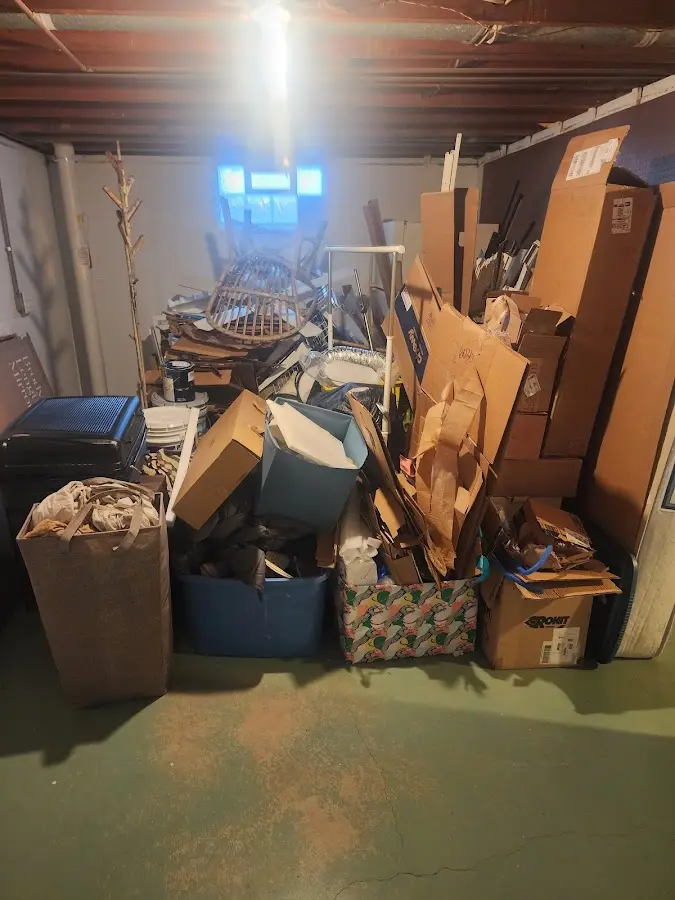 Roll-off dumpster container at job site for 15 Yard Dumpster Rental in Watertown